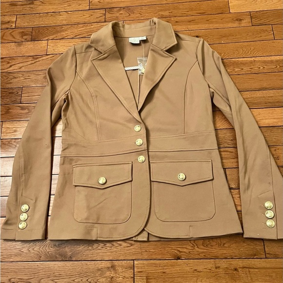 Tan-colored jacket with a structured, tailored design. Gold buttons.Size Medium - Picture 16 of 17